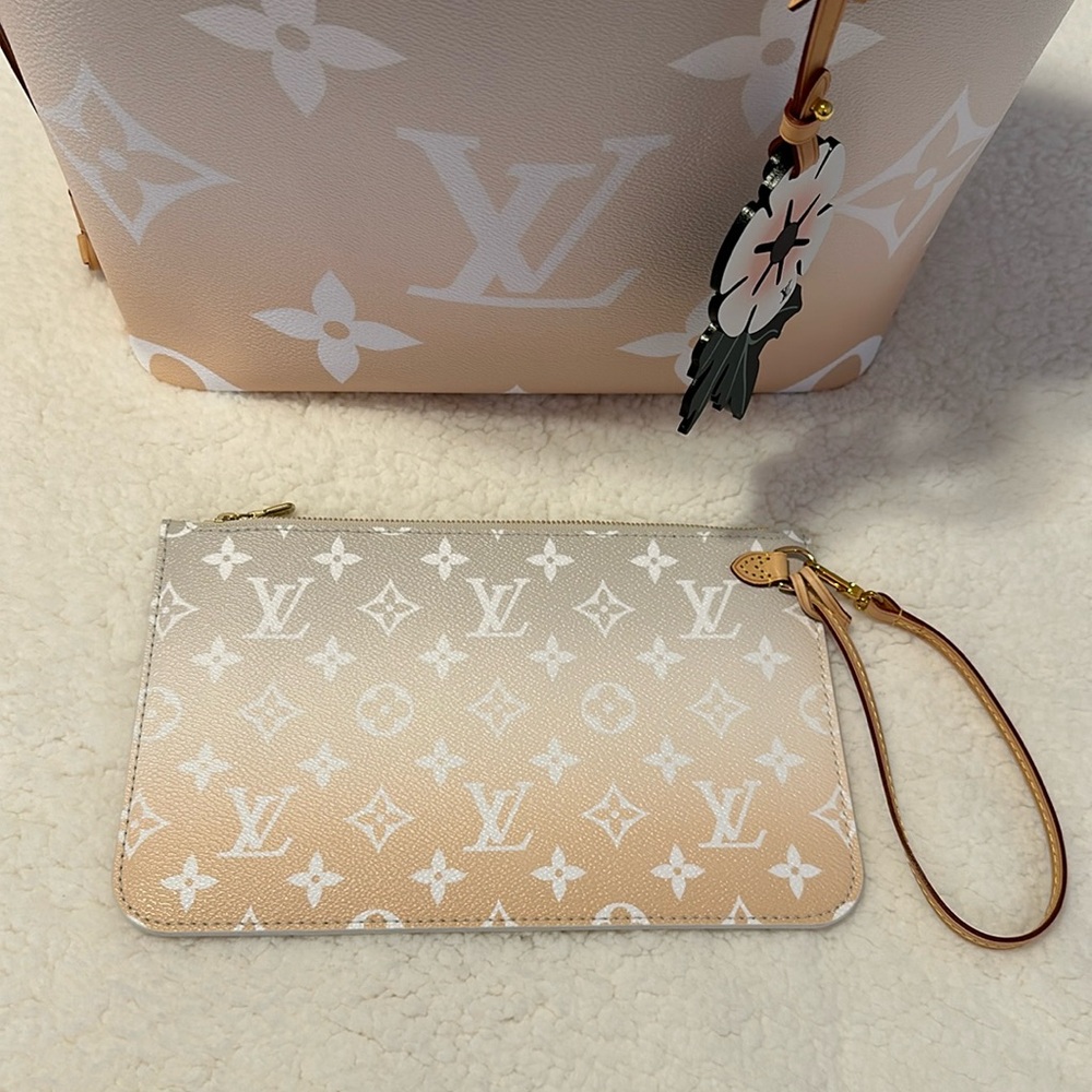 Louis Vuitton by the pool neverfull wristlet pouch